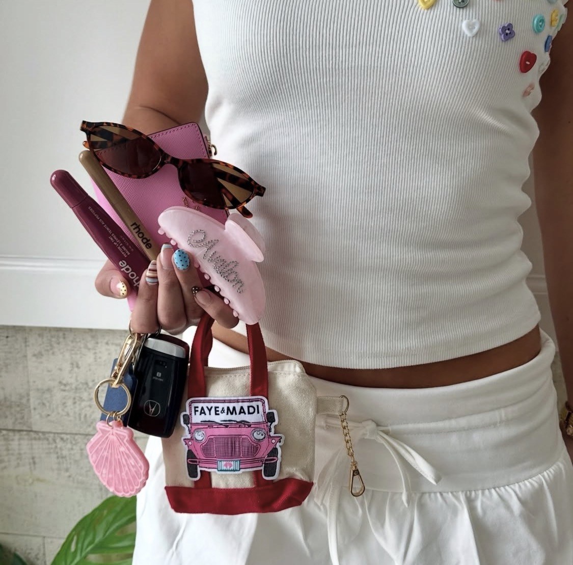Pink clip styled with a white outfit