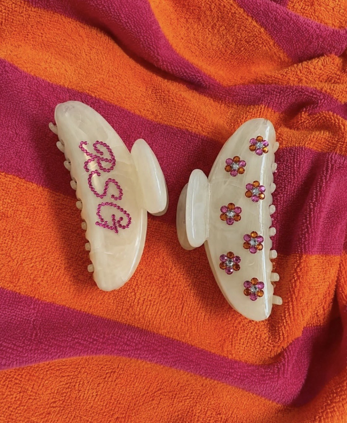 Cream floral clips on colorful fabric